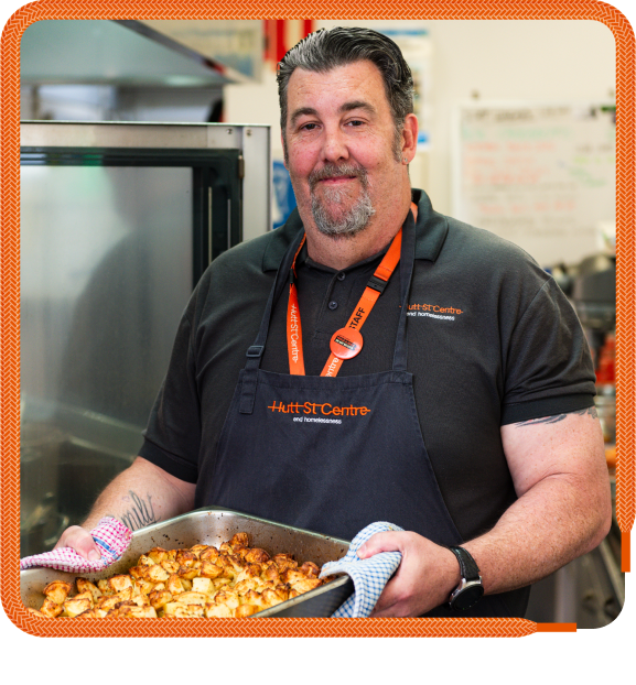 Kitchen Manager Peter with a tray of food